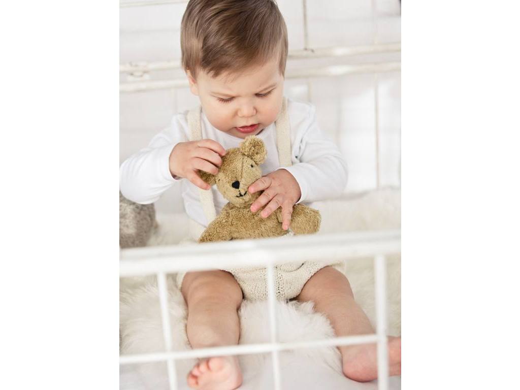 young boy with senger baby bear